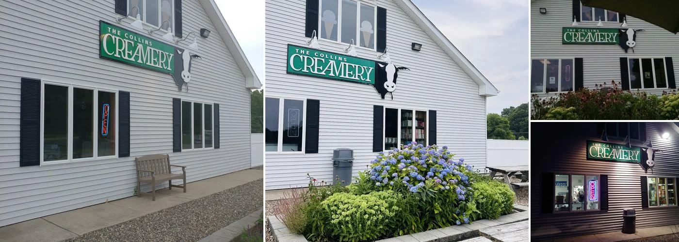 The white creamery building with its two green Collins Creamery signs
