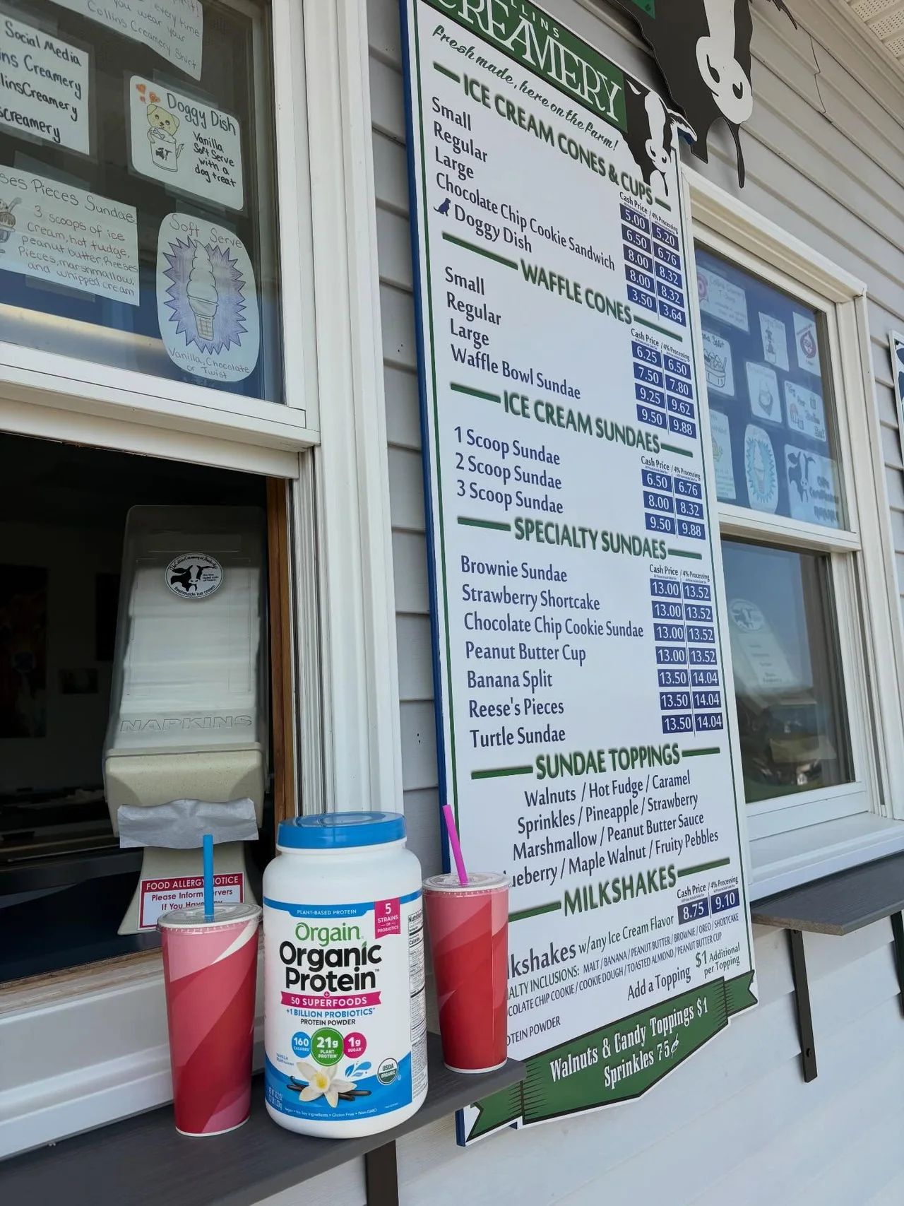 The order window with the flavor boards and a fresh milkshake