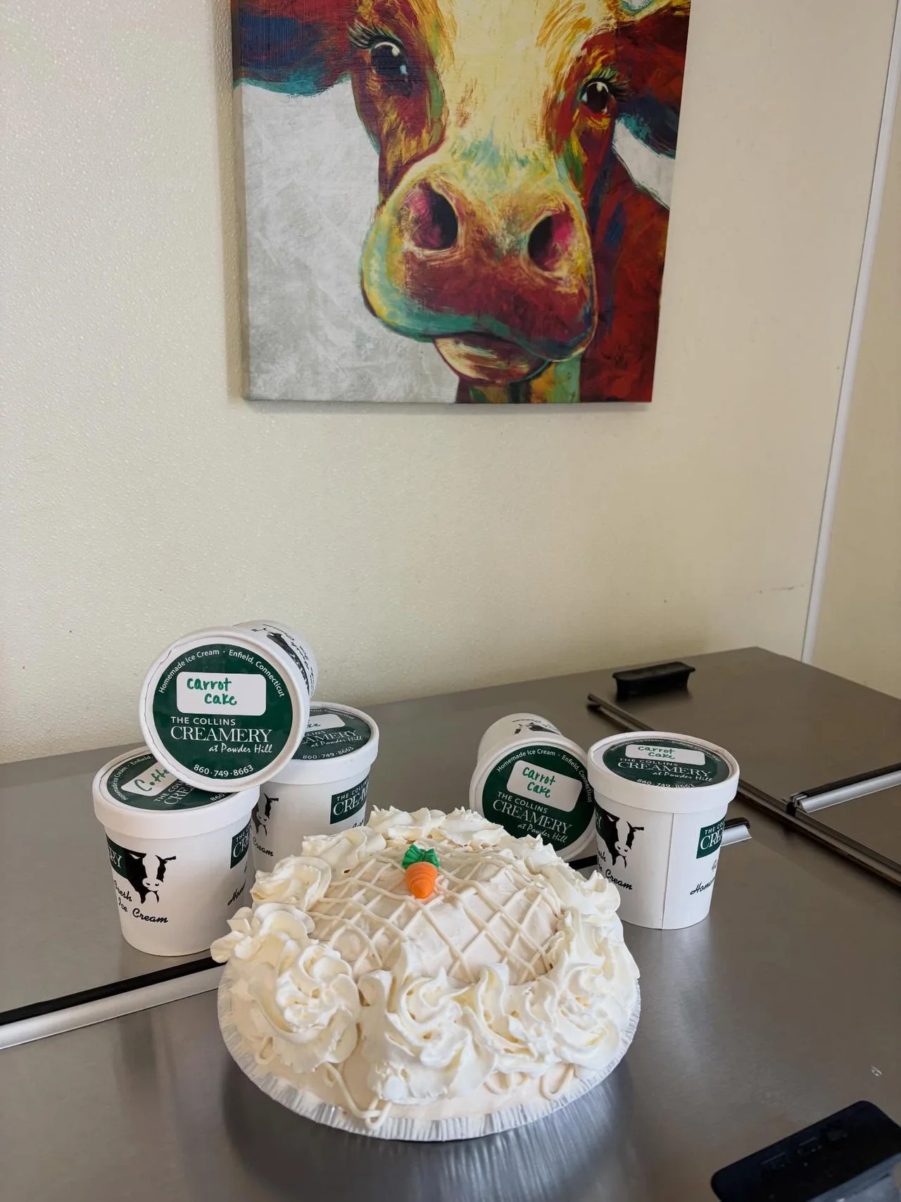 Collins Creamery pints and a carrot cake ice cream pie on the counter